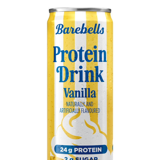 Barebells Protein Drink Vanilla can close-up showing yellow and white stripes and nutrition details