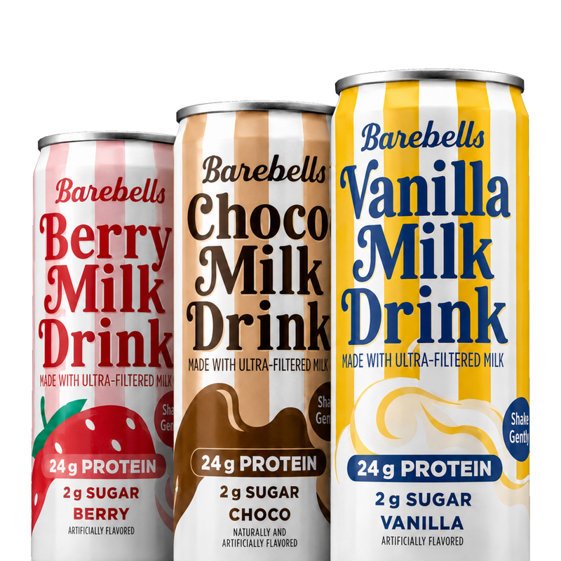 Three stacked cans of barebells milk drink